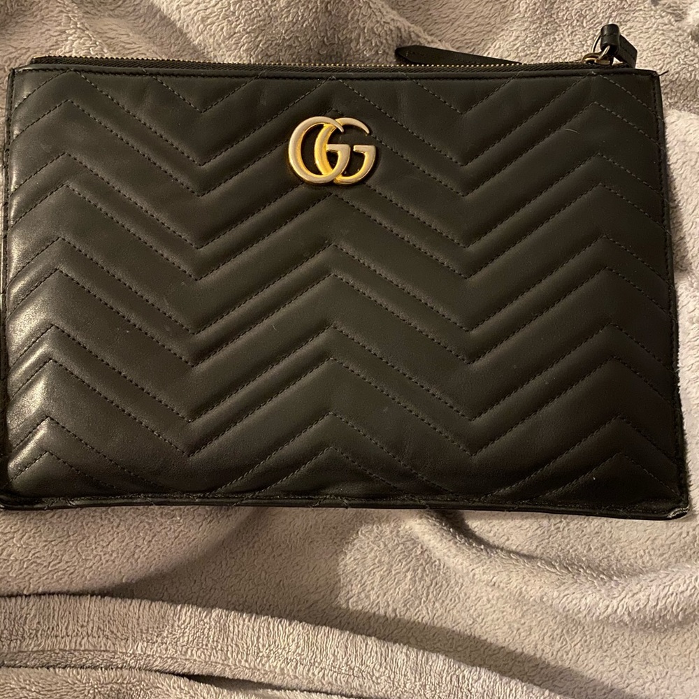 IN GOOD CONDITION LARGE GUCCI POUCH